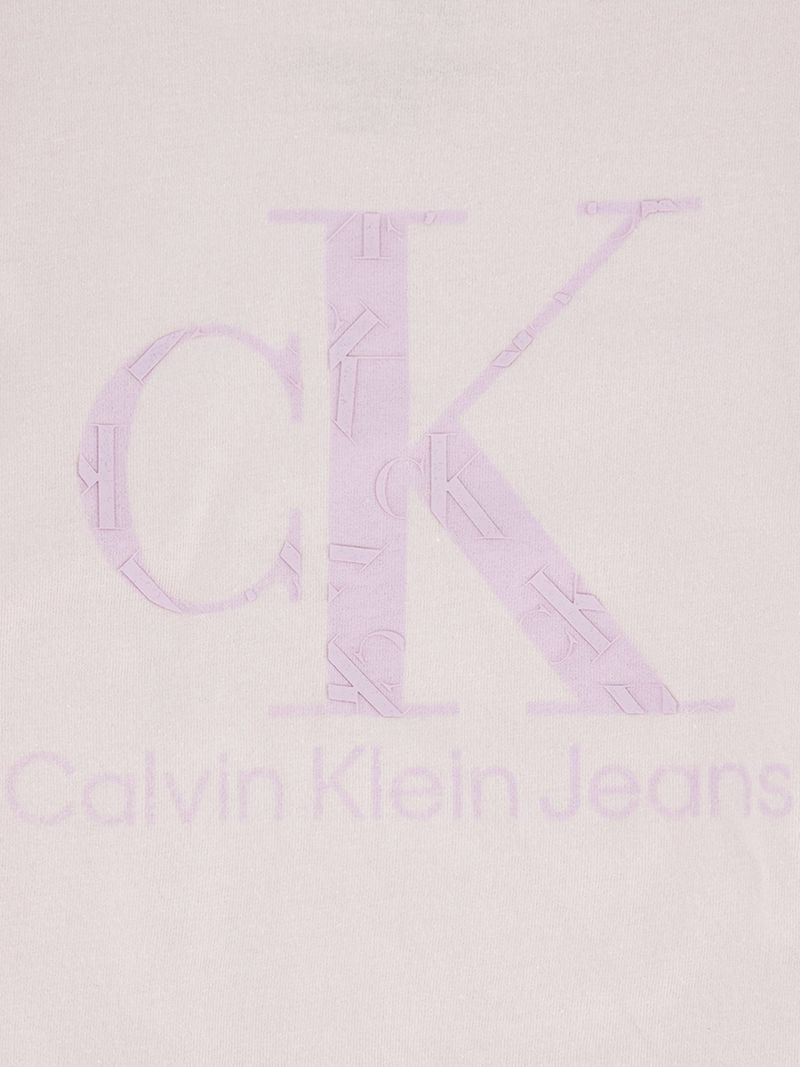 Polera-color-rosa-palido-Calvin-Klein-con-mangas-abullonadas