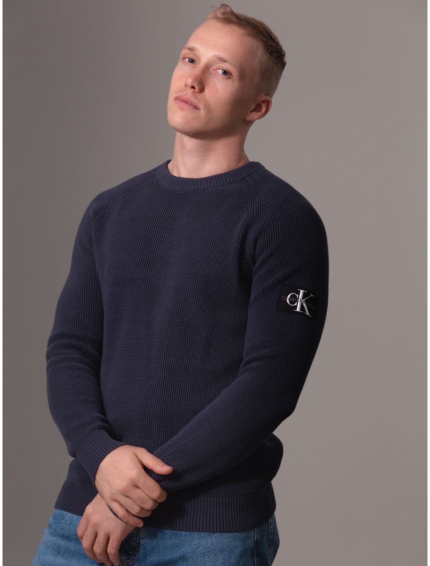 Sweater con insignia