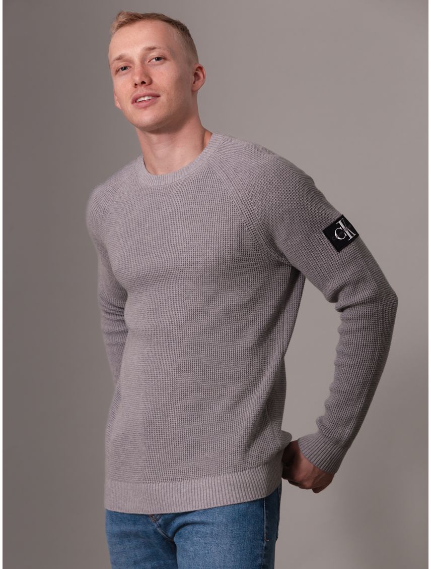 Sweater con insignia