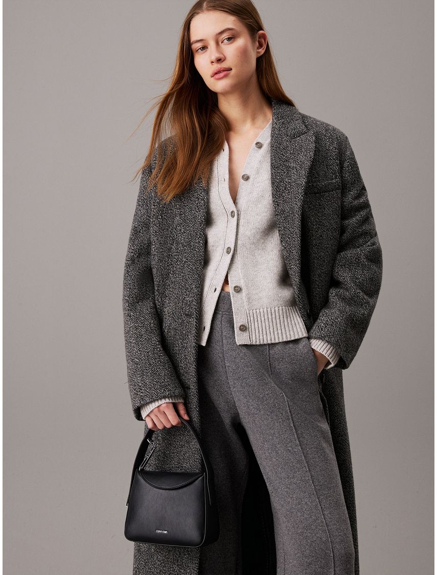 Cartera de Mano Soft Sculpt